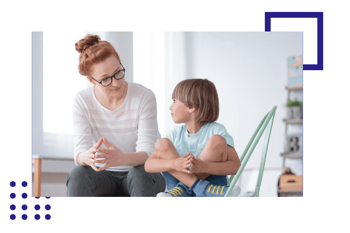 A woman and child sitting on the floor